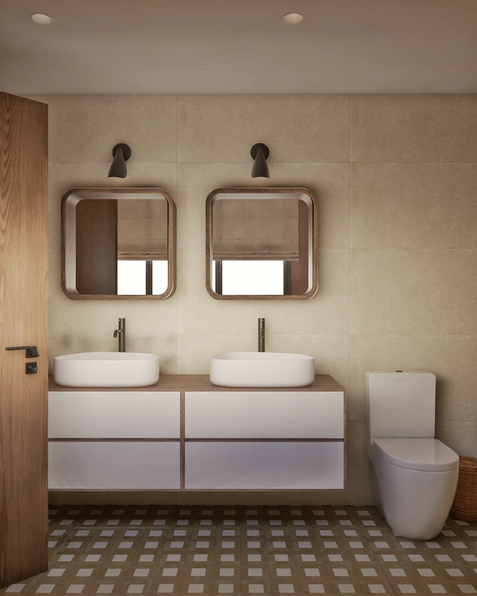 Baño doble con lavabo integrado y espejo de gran formato en reforma moderna