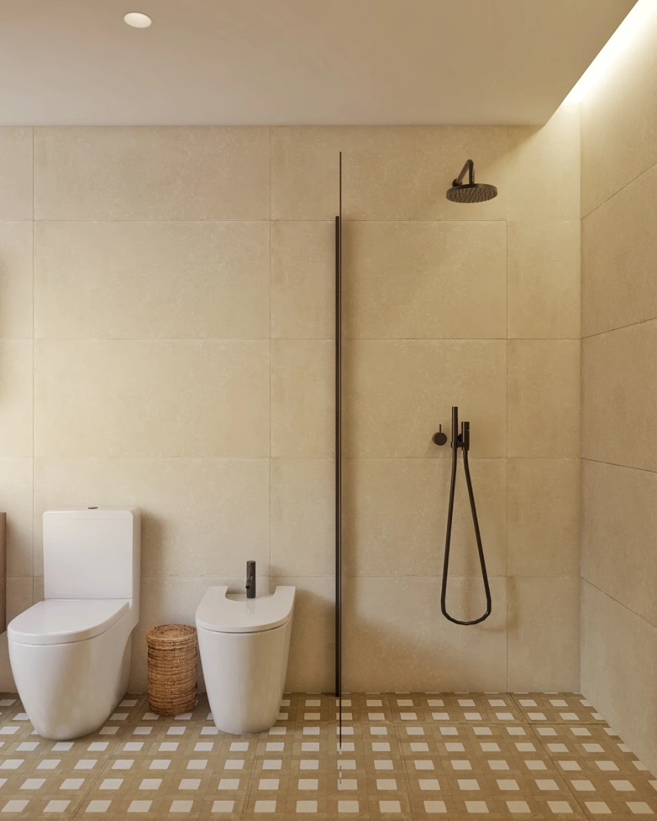 Baño doble con lavabo integrado y espejo de gran formato en reforma moderna